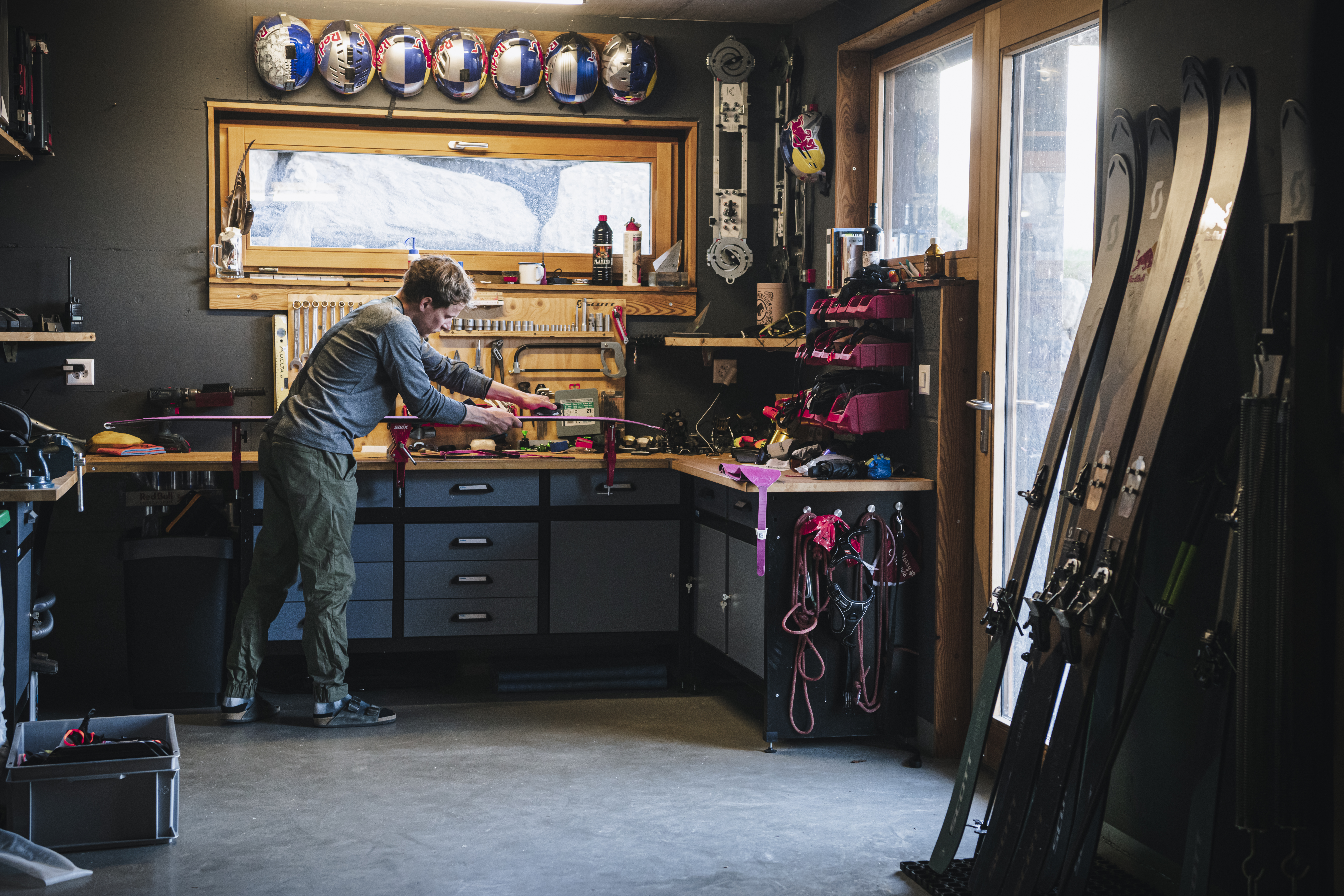 jérémie Heitz in his gear room in the garage at home in Les Granges, Valais, Switzerland.