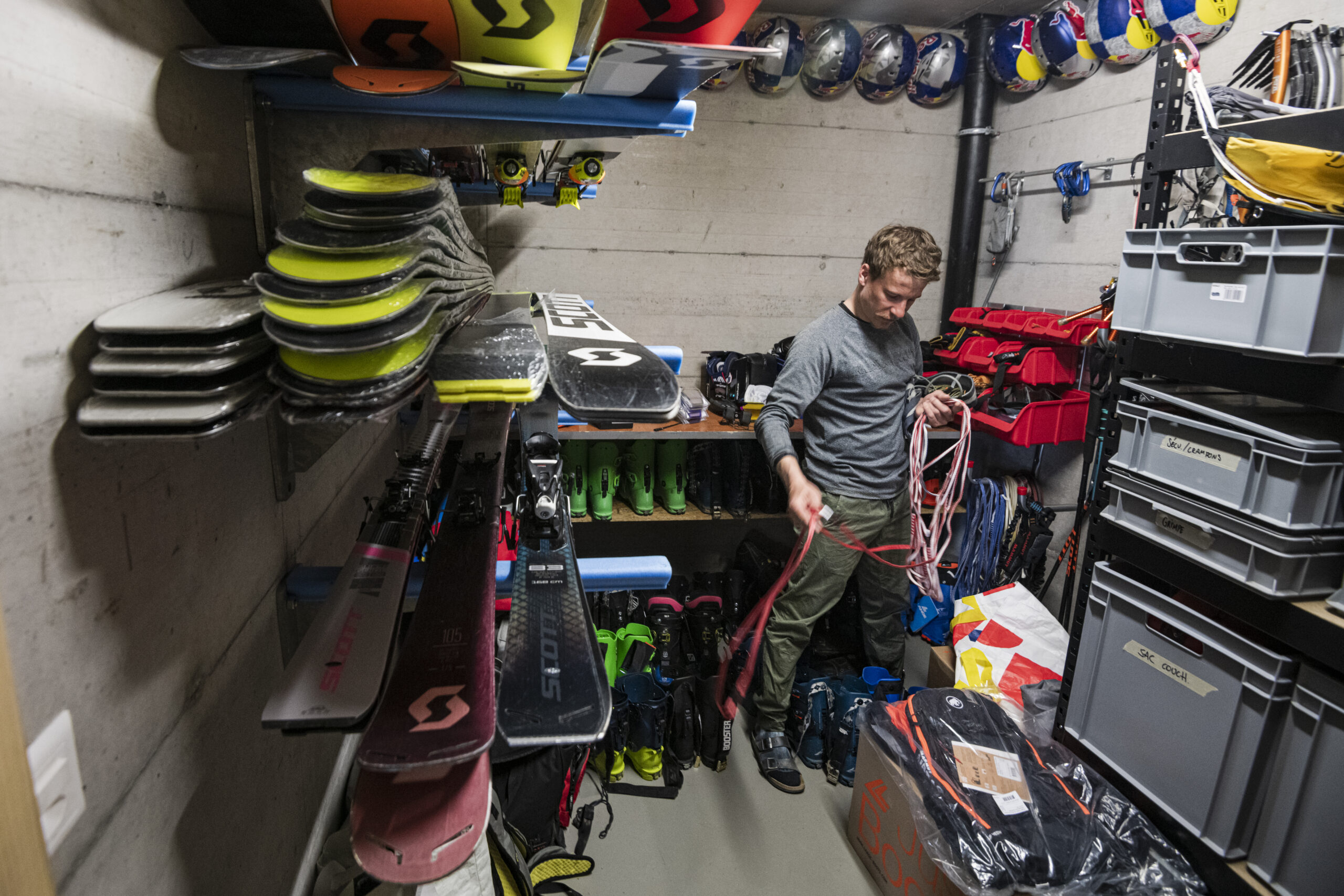 jérémie Heitz in his gear room in the garage at home in Les Granges, Valais, Switzerland.